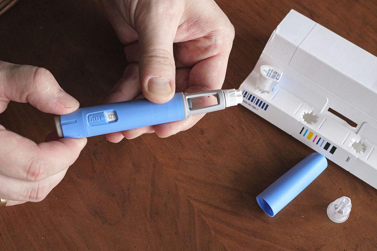 The National Institutes of Health — man preparing Semaglutide Ozempic injection control blood sugar levels