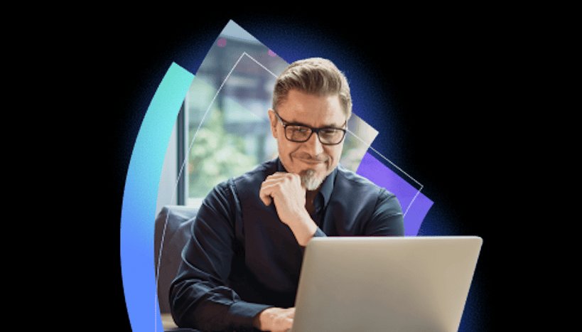 Coursera — Man at desk with laptop