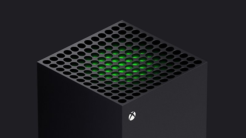 Microsoft — A closeup of the speaker grill on a black Xbox Series X.